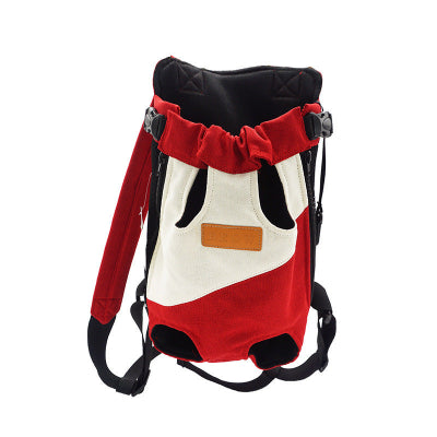 Sac de transport pour chat rouge et blanc présenté de face, avec sangles noires réglables et ouvertures pour les pattes.